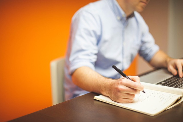 professional financial planning notebook and calculator on desk